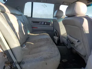 1995 Cadillac Fleetwood z VIN 1G6DW52P7SR706309, wystawiony jako Copart lot #76416794 z przebiegiem Nie podano mil oraz Szkody całkowita. Historia ofert i sprzedaży dostępna na DreamBid. Obrazek 10.