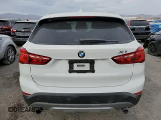 2018 BMW X1 sDrive28i with VIN WBXHU7C37J5H44386, listed as a Copart auction lot 42167135 with 96,668 mi miles and Salvage Title. Bid and sale history available at DreamBid. Image 6.