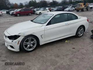 2015 BMW 4 Series 428i xDrive with VIN WBA3T1C52FP819767, listed as a Copart auction lot 82695004 with 71,648 mi miles and Salvage Title. Bid and sale history available at carsss.com. Image 1.