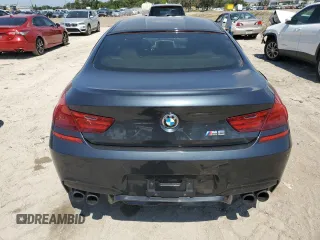 2015 BMW M6 z VIN WBS6C9C52FD468030, wystawiony jako Copart lot #70863134 z przebiegiem 66 839 mil mil oraz Szkoda całkowita • Salvage title. Historia ofert i sprzedaży dostępna na DreamBid. Obrazek 6.