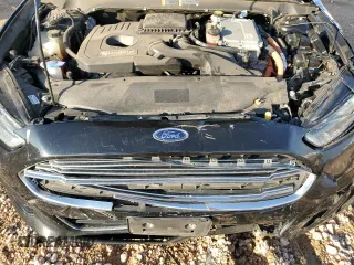 2016 Ford Fusion Titanium Hybrid with VIN 3FA6P0RU6GR356609, listed as a Copart auction lot 79803204 with 69,619 mi miles and Salvage Title. Bid and sale history available at carsss.com. Image 12.