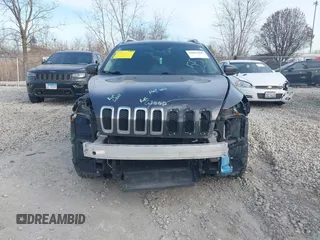 2017 Jeep Cherokee Limited with VIN 1C4PJMDBXHW582616, listed as a IAAI auction lot 41063889 with 125,839 mi miles and . Bid and sale history available at DreamBid. Image 13.