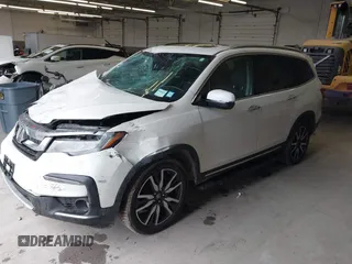 2019 Honda Pilot Elite with VIN 5FNYF6H08KB054725, listed as a IAAI auction lot 40496860 with 91,284 mi miles and . Bid and sale history available at DreamBid. Image 18.