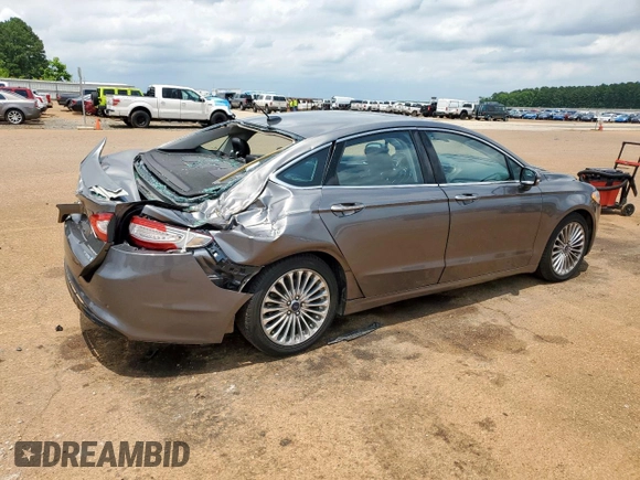 2014 Ford Fusion Titanium Hybrid with VIN 3FA6P0RU2ER158302, listed as a Copart auction lot 59049995 with 108,571 mi miles and Salvage title. Bid and sale history available at DreamBid. Image 3.