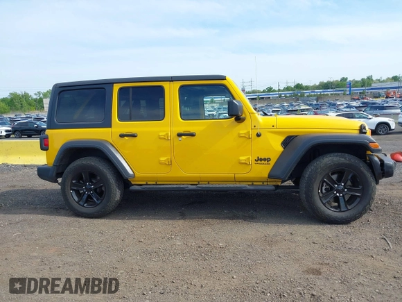 2021 Jeep Wrangler Unlimited Sport S with VIN 1C4HJXDN4MW744315, listed as a IAAI auction lot 42242941 with 35,344 mi miles and . Bid and sale history available at DreamBid. Image 13.
