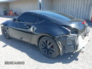 2019 Nissan 370Z Sport Touring with VIN JN1AZ4EH1KM420719, listed as a IAAI auction lot 42096816 with 97,803 mi miles and . Bid and sale history available at DreamBid. Image 3.