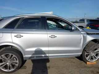 2017 Audi Q3 Premium Plus z VIN WA1JCCFSXHR000319, wystawiony jako IAAI lot #41986889 z przebiegiem 74 675 mil mil oraz . Historia ofert i sprzedaży dostępna na DreamBid. Obrazek 12.