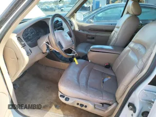 1999 Ford Explorer XLT with VIN 1FMZU34E8XZB27387, listed as a Copart auction lot 74398364 with 211,520 mi miles and Clean title. Bid and sale history available at DreamBid. Image 7.
