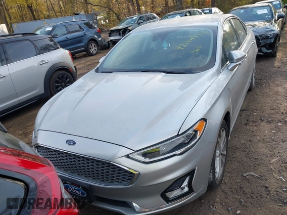 2019 Ford Fusion Titanium with VIN 3FA6P0SU8KR212370, listed as a IAAI auction lot 42114934 with 42,521 mi miles and . Bid and sale history available at DreamBid. Image 12.