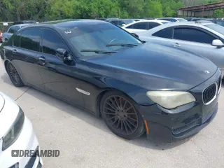2011 BMW 7 Series 750Li with VIN WBAKB8C55BC852304, listed as a IAAI auction lot 42017467 with 116,530 mi miles. Bid and sale history available at carsss.com. Image 1.
