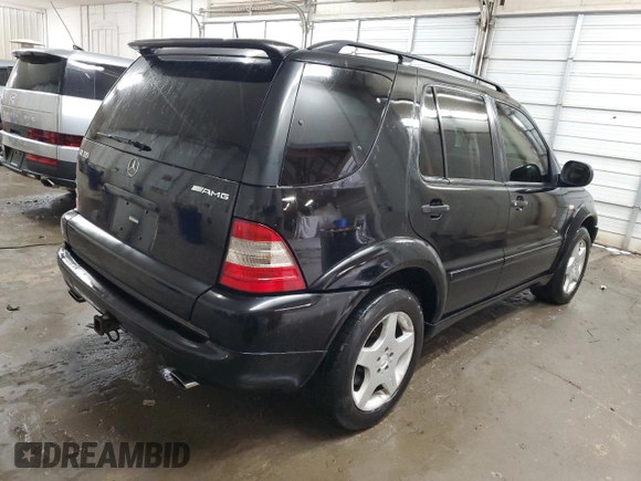 2000 Mercedes-Benz M-Class AMG with VIN 4JGAB74EXYA219143, listed as a Copart auction lot 71922634 with 156,092 mi miles and Salvage Title. Bid and sale history available at carsss.com. Image 3.
