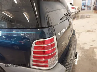 2003 Mercury Mountaineer Convenience z VIN 4M2ZU86W03UJ16828, wystawiony jako IAAI lot #41580919 z przebiegiem 148 968 mil mil oraz . Historia ofert i sprzedaży dostępna na DreamBid. Obrazek 19.