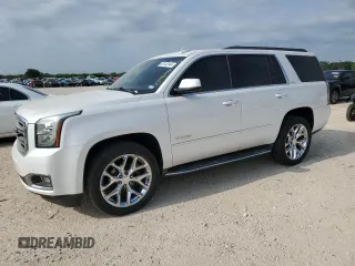 2016 GMC Yukon SLT with VIN 1GKS1BKC2GR248172, listed as a Copart auction lot 53146144 with 125,968 mi miles and Salvage Title. Bid and sale history available at carsss.com. Image 1.