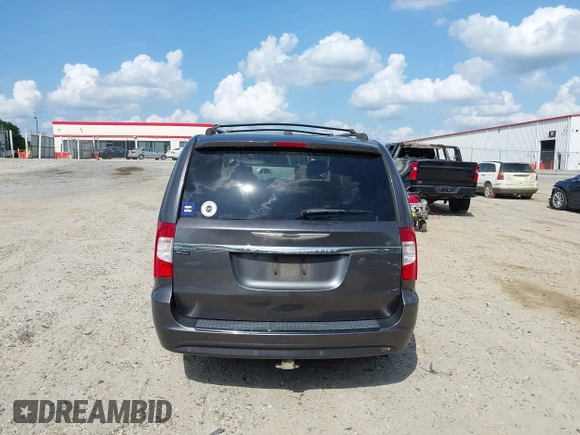 2016 Chrysler Town & Country S with VIN 2C4RC1HG4GR271360, listed as a IAAI auction lot 42114489 with 140,439 mi miles. Bid and sale history available at carsss.com. Image 16.