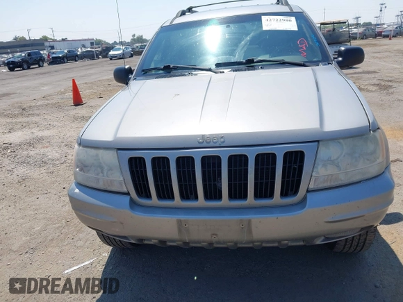 2000 Jeep Grand Cherokee Limited with VIN 1J4GW58N5YC361724, listed as a IAAI auction lot 42722980 with 136,590 mi miles and . Bid and sale history available at DreamBid. Image 6.