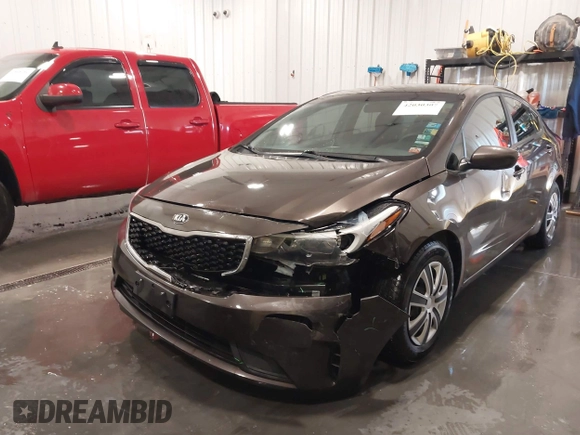 2017 Kia Forte LX with VIN 3KPFK4A71HE056667, listed as a IAAI auction lot 42030307 with 99,320 mi miles. Bid and sale history available at carsss.com. Image 6.
