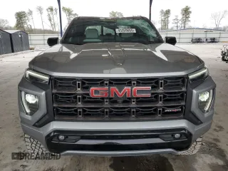 2024 GMC Canyon 4WD AT4X with VIN 1GTP6EEK1R1158021, listed as a Copart auction lot 43359665 with 14,120 mi miles and Salvage Title. Bid and sale history available at carsss.com. Image 5.