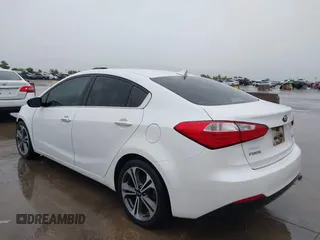 2016 Kia Forte EX with VIN KNAFX4A82G5450616, listed as a IAAI auction lot 42107042 with 131,419 mi miles. Bid and sale history available at carsss.com. Image 3.