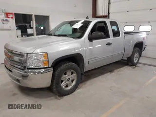2013 Chevrolet Silverado 1500 LT with VIN 1GCRKSE73DZ328002, listed as a IAAI auction lot 41842745 with 124,496 mi miles and . Bid and sale history available at DreamBid. Image 2.