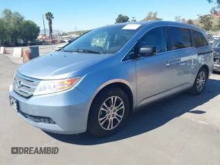 2012 Honda Odyssey EX-L with VIN 5FNRL5H69CB003067, listed as a IAAI auction lot 41862591 with 163,158 mi miles and . Bid and sale history available at carsss.com. Image 17.