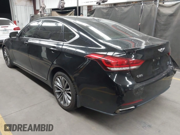 2017 Genesis G80 3.8L z VIN KMHGN4JE4HU175479, wystawiony jako IAAI lot #42161608 z przebiegiem 118 066 mil mil oraz . Historia ofert i sprzedaży dostępna na DreamBid. Obrazek 3.