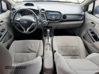 2011 Honda Insight EX with VIN JHMZE2H77BS006079, listed as a Copart auction lot 63873985 with 134,159 mi miles and Salvage title. Bid and sale history available at DreamBid. Image 8.
