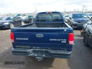 2004 Dodge Dakota SLT with VIN 1D7HG42N44S519910, listed as a IAAI auction lot 41737881 with 154,008 mi miles. Bid and sale history available at carsss.com. Image 16.
