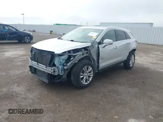 2020 Cadillac XT5 Premium Luxury AWD with VIN 1GYKNDRS4LZ178042, listed as a IAAI auction lot 41583102 with 87,085 mi miles and . Bid and sale history available at carsss.com. Image 2.
