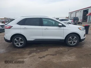 2020 Ford Edge SEL with VIN 2FMPK4J9XLBA93315, listed as a IAAI auction lot 42073323 with 103,210 mi miles and . Bid and sale history available at DreamBid. Image 13.