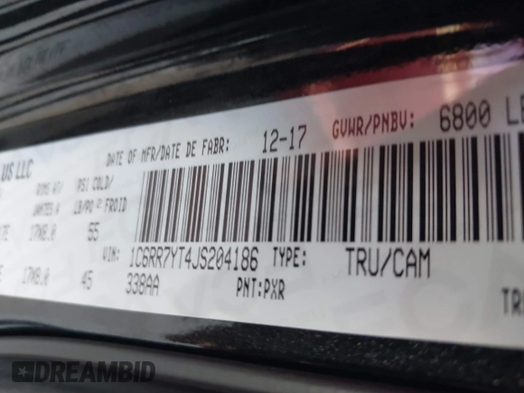 2018 Ram 1500 Rebel with VIN 1C6RR7YT4JS204186, listed as a IAAI auction lot 42668658 with 96,025 mi miles and . Bid and sale history available at DreamBid. Image 9.