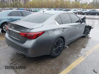 2018 Infiniti Q50 Luxe z VIN JN1EV7AP5JM350376, wystawiony jako IAAI lot #40881855 z przebiegiem 84 501 mil mil oraz . Historia ofert i sprzedaży dostępna na DreamBid. Obrazek 4.