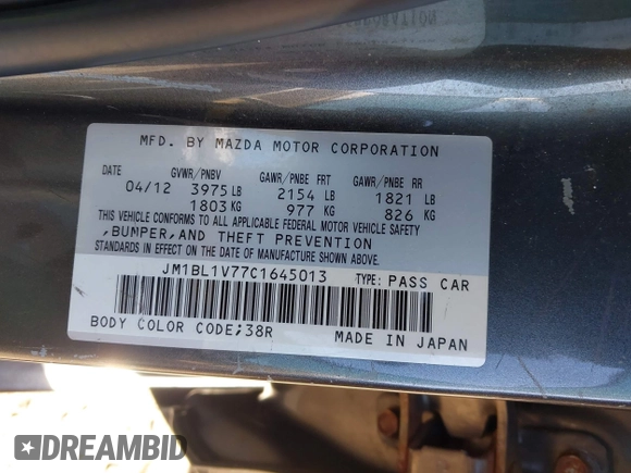2012 Mazda Mazda3 i Touring with VIN JM1BL1V77C1645013, listed as a IAAI auction lot 41964186 with 129,320 mi miles. Bid and sale history available at carsss.com. Image 9.
