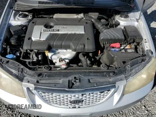 2006 Kia Spectra EX with VIN KNAFE121365229594, listed as a Copart auction lot 77311084 with 129,789 mi miles and Salvage Title. Bid and sale history available at carsss.com. Image 11.
