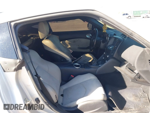 2014 Nissan 370Z Nismo with VIN JN1AZ4EHXEM634418, listed as a IAAI auction lot 41308580 with 84,074 mi miles and . Bid and sale history available at DreamBid. Image 5.