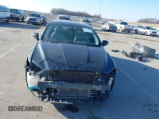 2016 Ford Fusion Titanium Hybrid with VIN 3FA6P0RU6GR156622, listed as a IAAI auction lot 41178887 with 92,423 mi miles. Bid and sale history available at carsss.com. Image 13.