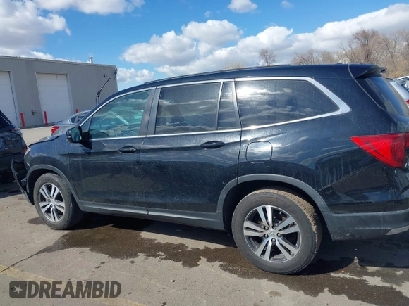 2016 Honda Pilot EX-L with VIN 5FNYF6H53GB048317, listed as a IAAI auction lot 41826297 with 127,672 mi miles. Bid and sale history available at carsss.com. Image 14.