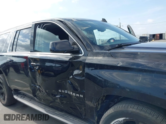 2020 Chevrolet Suburban LT with VIN 1GNSCHKC2LR229759, listed as a IAAI auction lot 42128257 with 46,138 mi miles and . Bid and sale history available at DreamBid. Image 6.