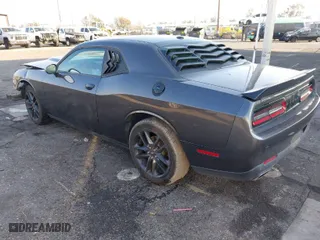 2021 Dodge Challenger GT with VIN 2C3CDZKG4MH677574, listed as a IAAI auction lot 41460036 with 67,170 mi miles. Bid and sale history available at carsss.com. Image 3.