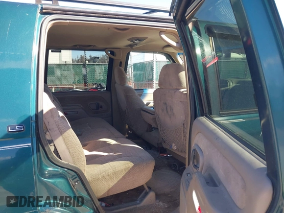 1999 Chevrolet Tahoe Z71 z VIN 1GNEK13R2XJ325602, wystawiony jako IAAI lot #41590107 z przebiegiem 204 611 mil mil oraz . Historia ofert i sprzedaży dostępna na DreamBid. Obrazek 8.