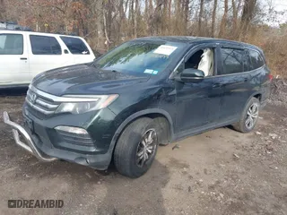 2016 Honda Pilot EX with VIN 5FNYF6H31GB050419, listed as a IAAI auction lot 41635973 with 77,739 mi miles. Bid and sale history available at carsss.com. Image 2.
