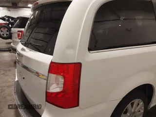 2015 Chrysler Town & Country Touring with VIN 2C4RC1BG9FR626482, listed as a IAAI auction lot 41879865 with 129,694 mi miles and . Bid and sale history available at DreamBid. Image 18.