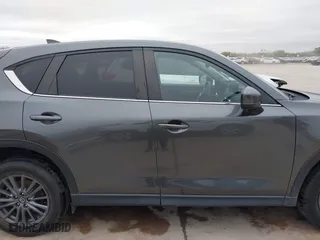 2021 Mazda CX-5 Touring with VIN JM3KFBCM0M0342210, listed as a IAAI auction lot 41236013 with 96,012 mi miles. Bid and sale history available at carsss.com. Image 14.