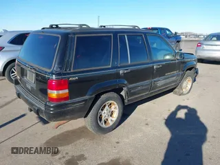 1996 Jeep Grand Cherokee Limited with VIN 1J4GZ78S5TC196338, listed as a IAAI auction lot 41199541 with Not Provided miles. Bid and sale history available at carsss.com. Image 4.