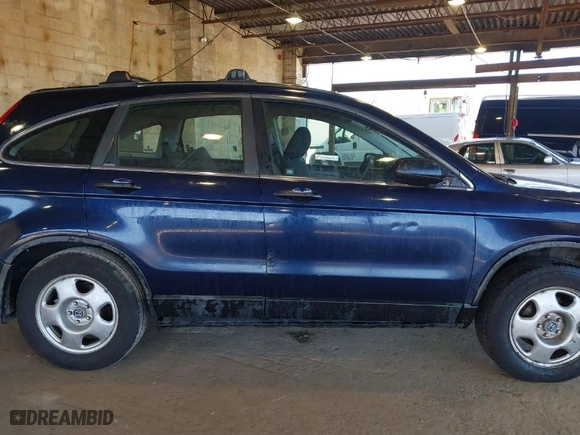 2009 Honda CR-V LX with VIN 5J6RE483X9L061781, listed as a IAAI auction lot 41893907 with 211,511 mi miles. Bid and sale history available at carsss.com. Image 14.