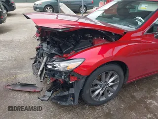 2020 Mazda 6 Sport with VIN JM1GL1UM9L1526019, listed as a IAAI auction lot 42092321 with 73,660 mi miles and . Bid and sale history available at DreamBid. Image 6.