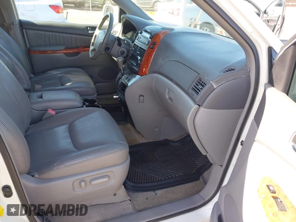 2010 Toyota Sienna XLE with VIN 5TDYK4CC3AS336590, listed as a IAAI auction lot 41798194 with 230,707 mi miles. Bid and sale history available at carsss.com. Image 5.