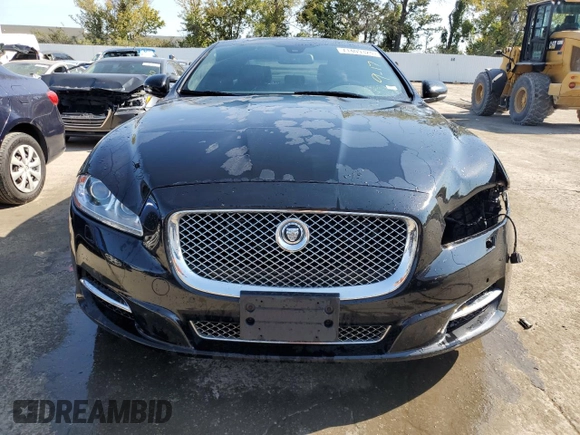 2013 Jaguar XJ Supercharged with VIN SAJWA2GE3DMV42875, listed as a Copart auction lot 71409324 with 129,422 mi miles and Salvage title. Bid and sale history available at DreamBid. Image 5.