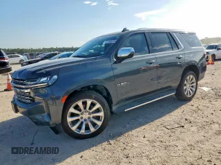 2021 Chevrolet Tahoe Premier with VIN 1GNSKSKDXMR141794, listed as a Copart auction lot 61998235 with 47,834 mi miles and Salvage title. Bid and sale history available at DreamBid. Image 1.