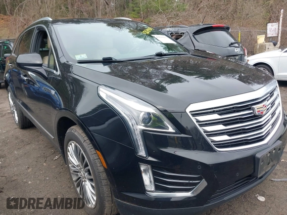 2017 Cadillac XT5 Luxury AWD with VIN 1GYKNDRS3HZ320498, listed as a IAAI auction lot 42039983 with 51,654 mi miles and . Bid and sale history available at carsss.com. Image 1.