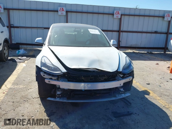 2022 Tesla Model 3 with VIN 5YJ3E1EA7NF103513, listed as a IAAI auction lot 41643592 with 35,631 mi miles and . Bid and sale history available at DreamBid. Image 12.